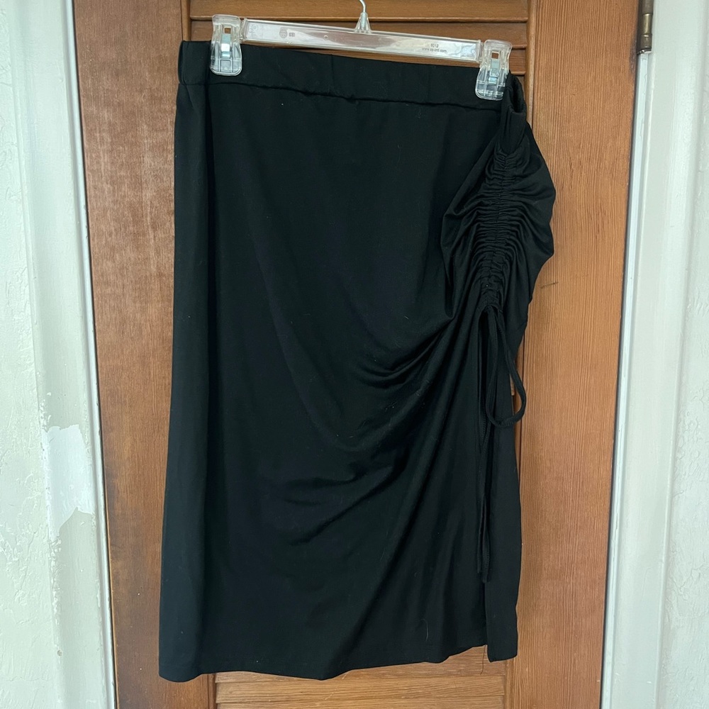 Black pencil skirt with adjustable slit